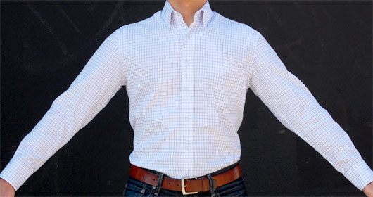 dress shirt armhole height man wearing dress shirt with arms extended
