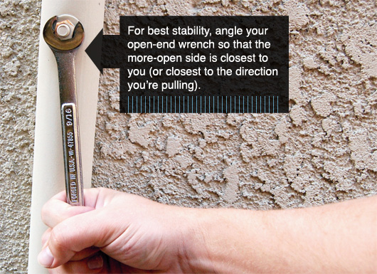 wrench pull Angle a wrench so the open side is closest to you