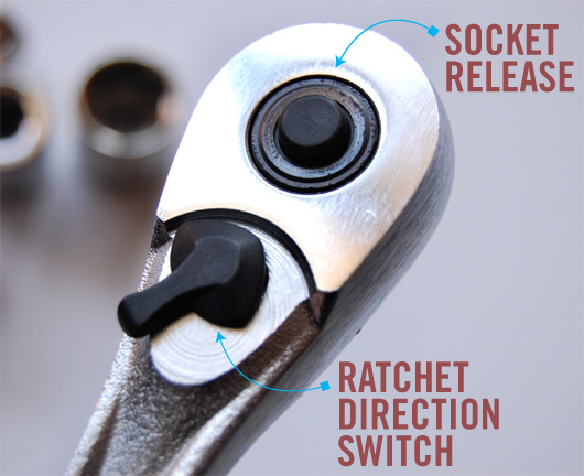 ratchet controls A close up of a socket release button and ratchet direction switch