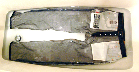 Levis 501 Shrink to Fit soaking in a bath tub of hot water