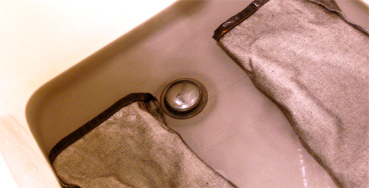 levi's 501 shrink to fit instructions Levi's shrink to fit jeans in a bath rub of hot water with indigo dye from jeans coming off into the water