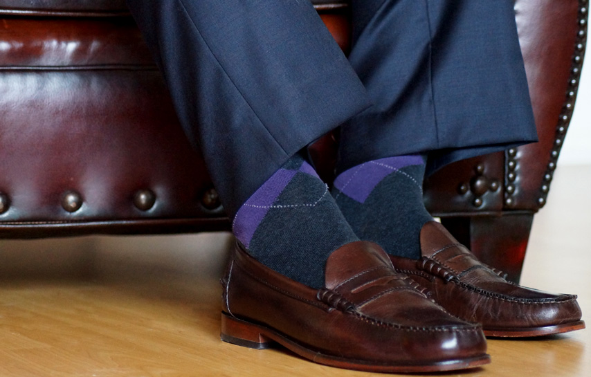 Man wearing loafers with a suit