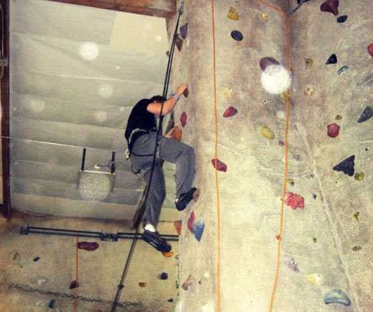 A man climbing a rock wall