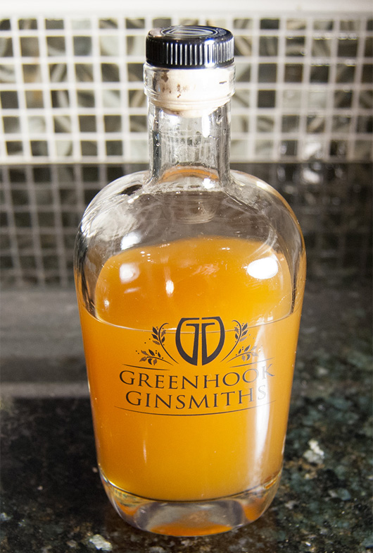 Combining the ingredients for homemade bitters