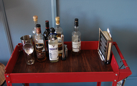 Spirit bottles on bar cart