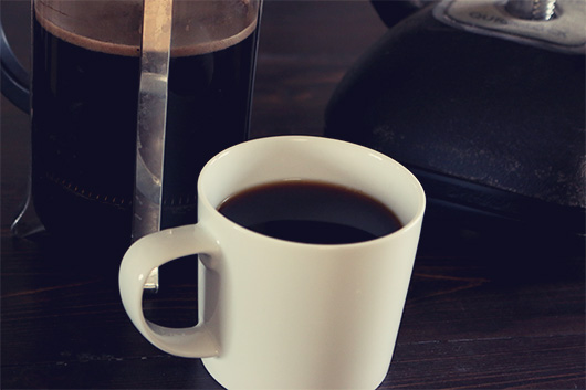 A cup of coffee on a table