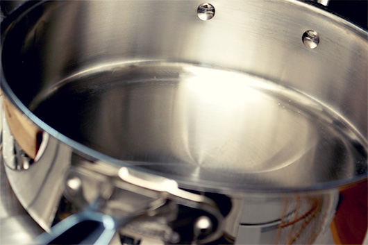 A close up of a metal pan on a stove