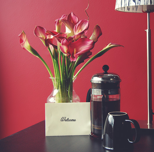 A vase filled with flowers sitting on a table