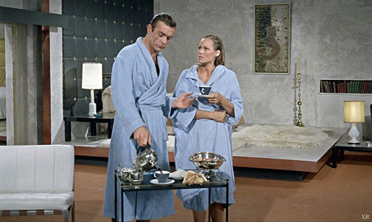 James Bond wearing a blue robe