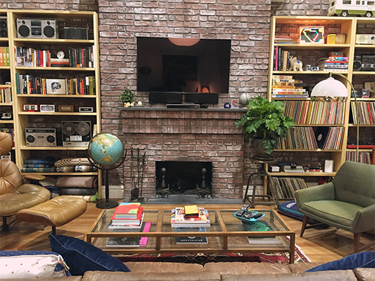 Dev\'s living room with fireplace and tv