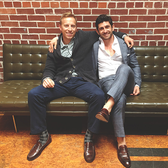 Aaron Marino and Andrew Snavely sitting on a bench