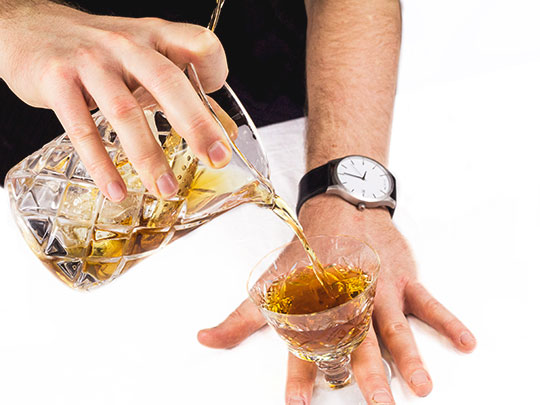 Straining a cocktail