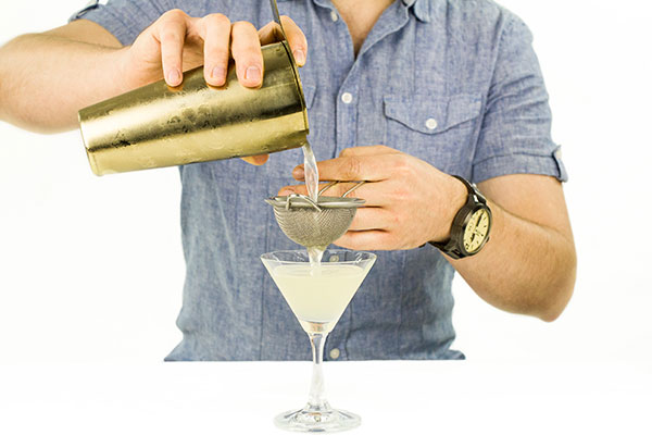 Straining a cocktail