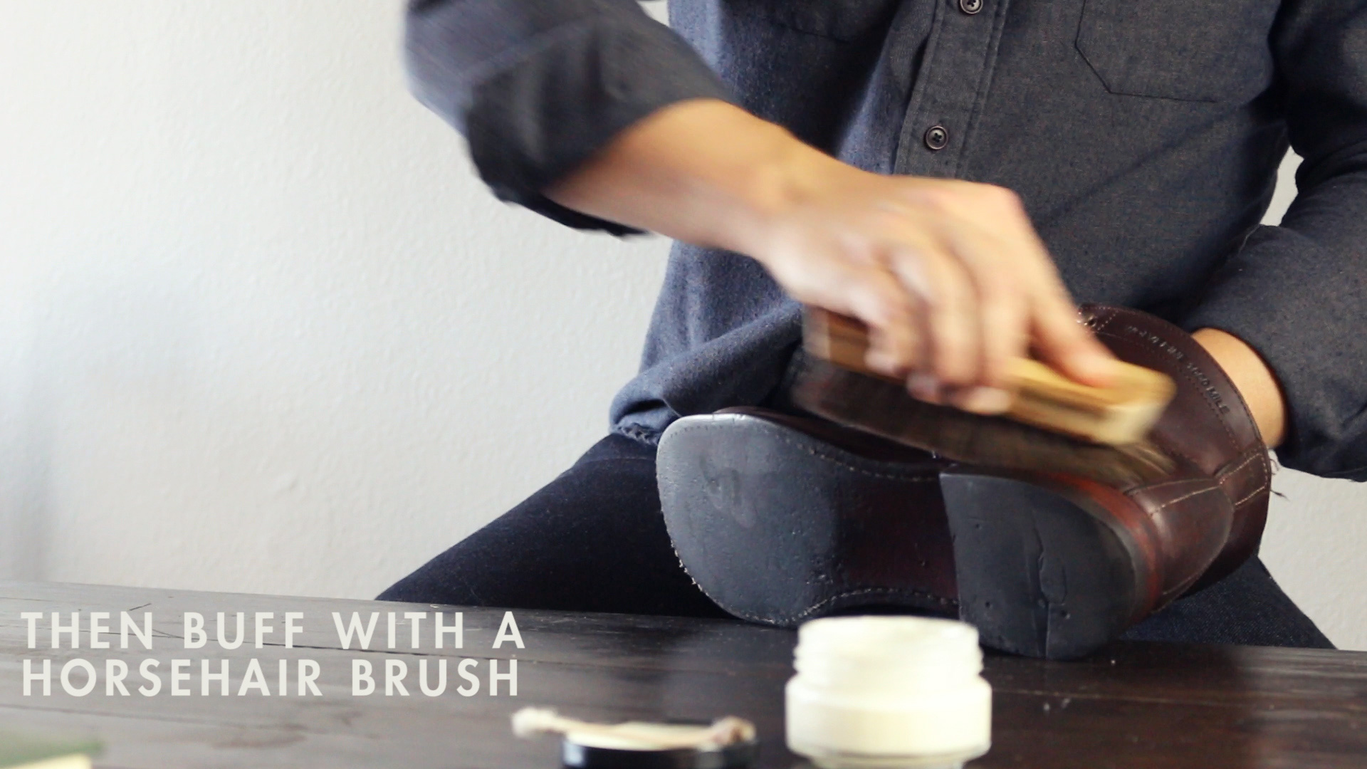 buff with a horsehair brush