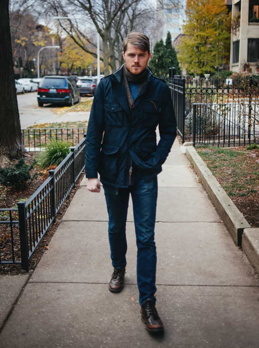 blue waxed canvas jacket outfit with jeans and boots
