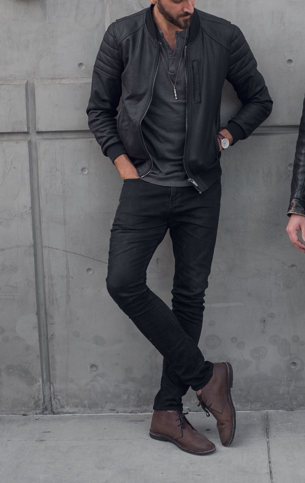 What to wear to a show and drinks men's casual outfit ideas black jeans brown boots leather bomber jacket
