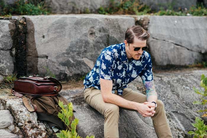 A man sitting on a rock
