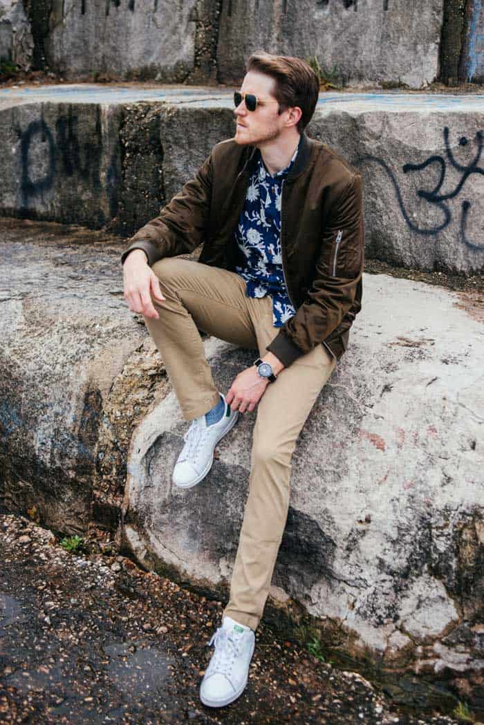 A man sitting on a rock