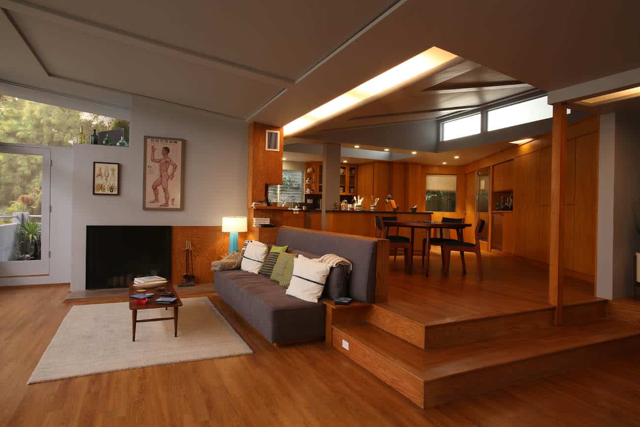 A view of a living room filled with furniture and a wood floor