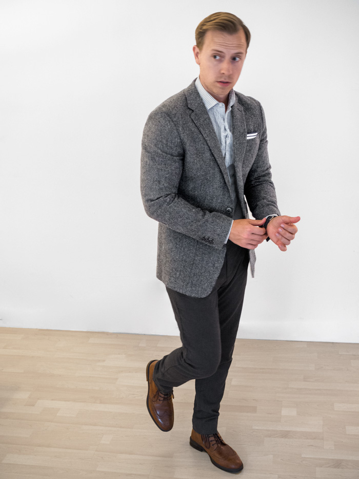 A man wearing a suit and tie