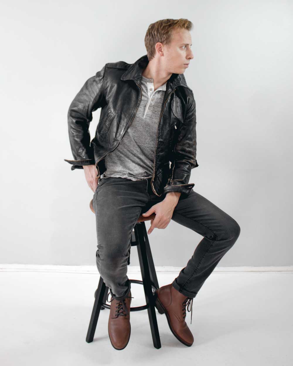 men street style leather jacket henley black jeans brown boots