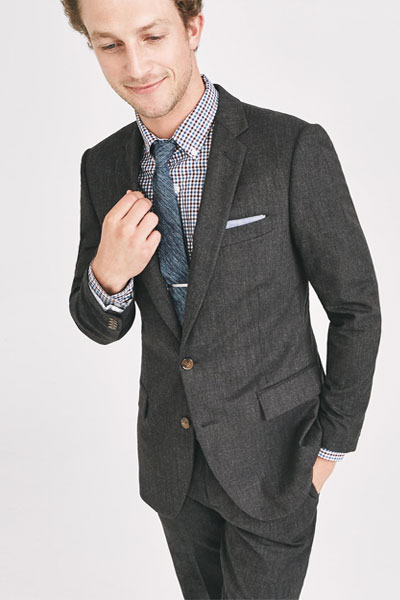 A man wearing a suit and tie