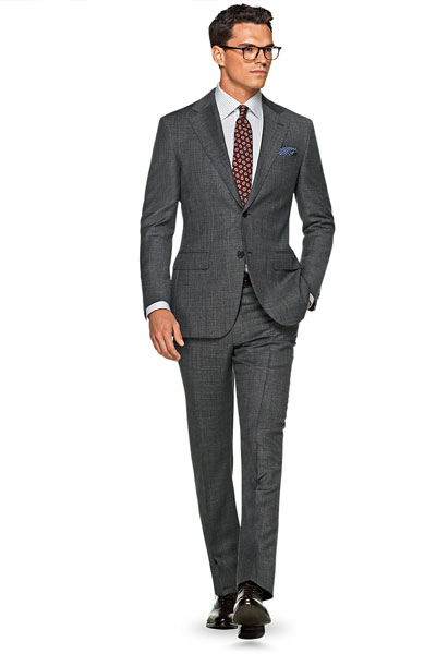 A man wearing a suit and tie