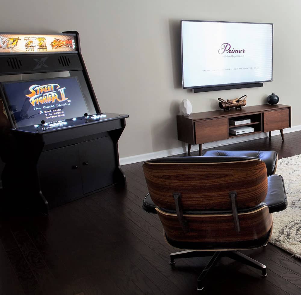 Daniel-home_6 arcade in living room eames lounge chair mid century modern man living room apartment home