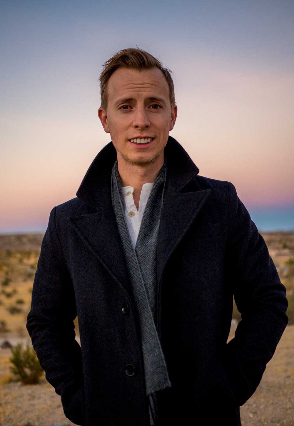 Photo of man wearing a layered outfit in Joshua Tree