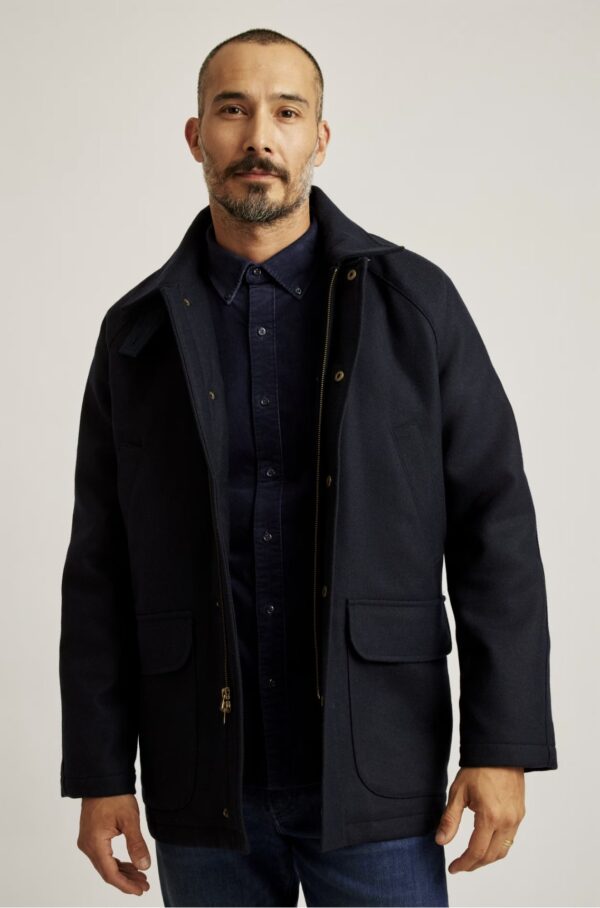 a man wearing a wool field jacket