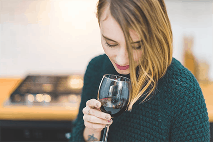 drink A woman holding a wine glass