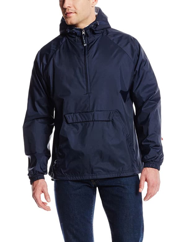 A person standing posing for the camera, with Charles River RAIN JACKET