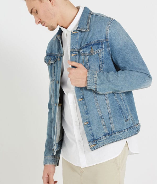 A man wearing a blue jacket