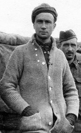 cardigan-history A vintage photo of a man wearing a sweater