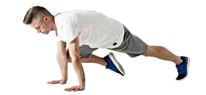 Image of man doing mountain climber exercise