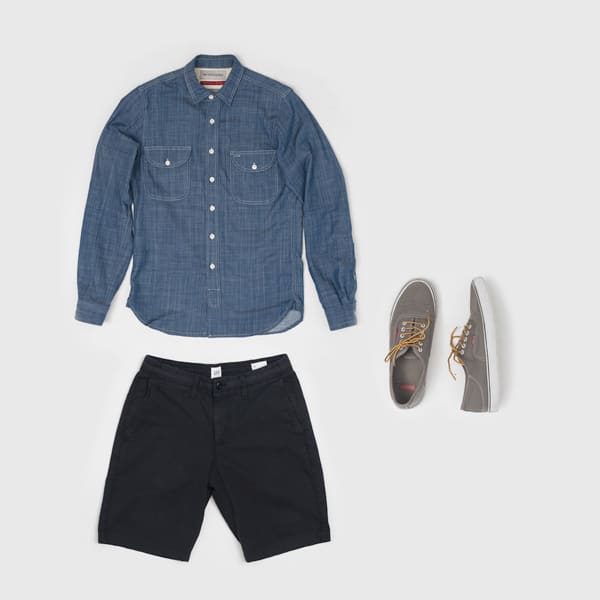 men fashion flatlay chambray shirt black shorts gray vans