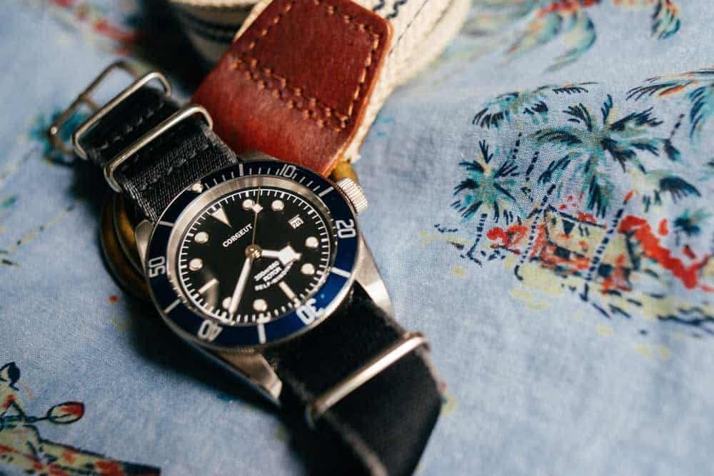 best-dive-watch-homage-corgeut A close up of a watch on a nato strap