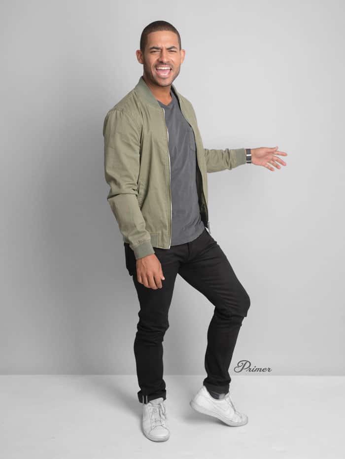 men fashion minimalist fashion olive bomber gray tshirt black jeans white snakers