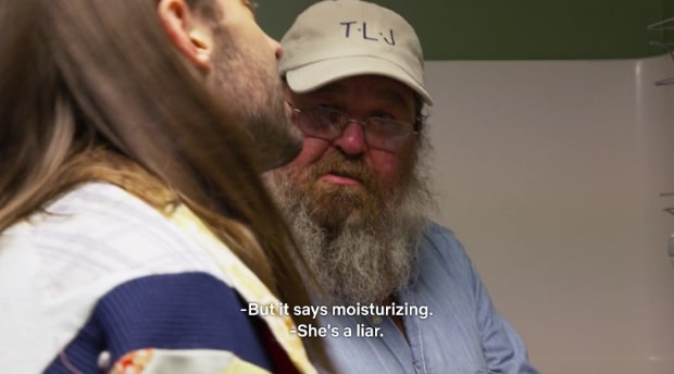 A man wearing a hat, with Jonathan van ness