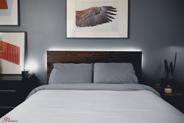 philips hue lightstrip behind headboard in bedroom