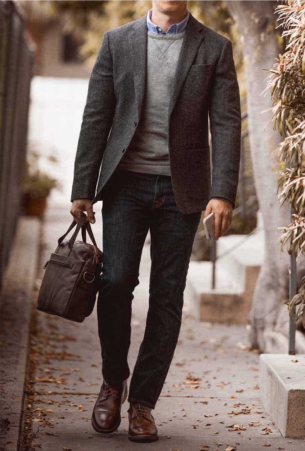 tweed blazer over sweatshirt with jeans and boots