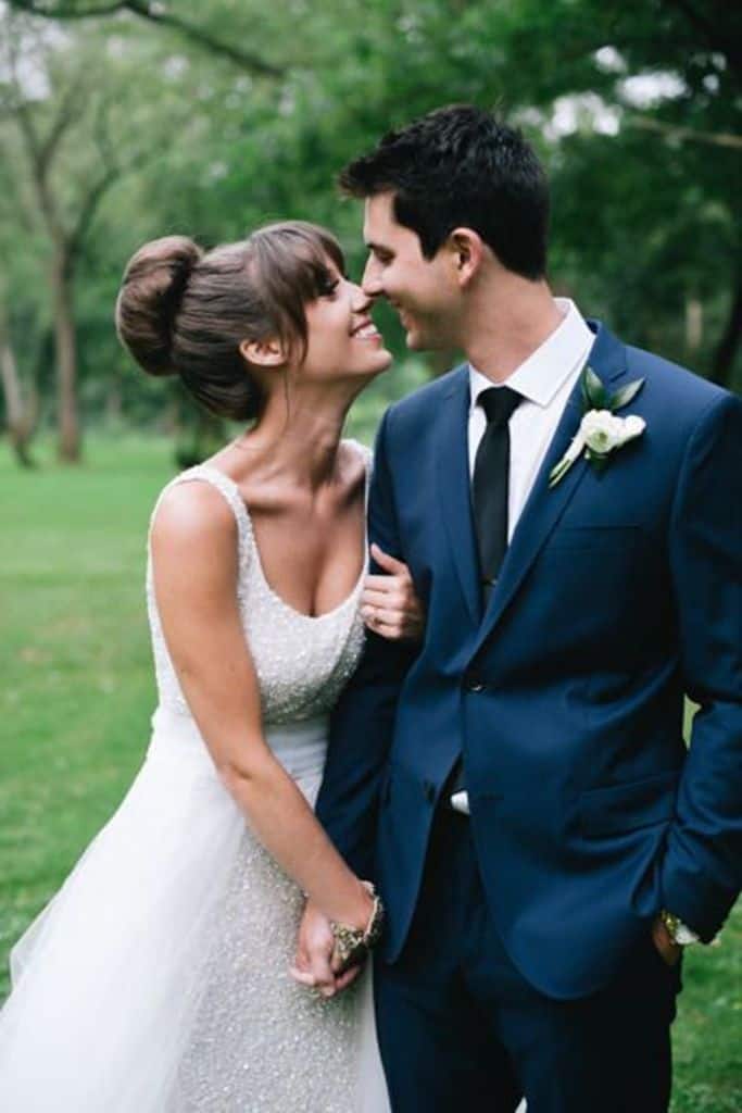 blue suit with black tie wedding