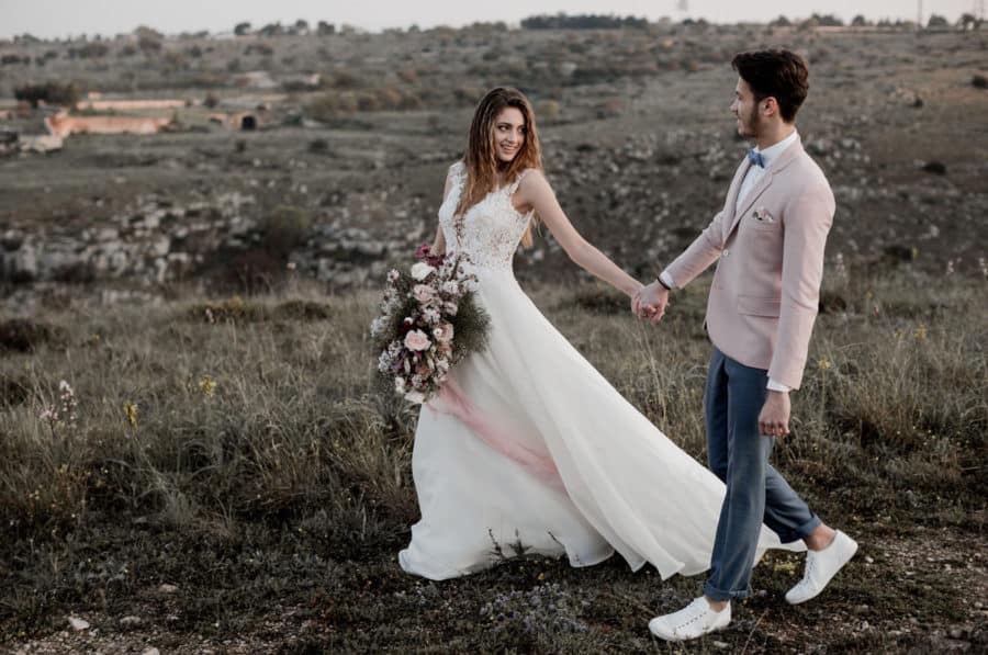 groom wearing sneakers