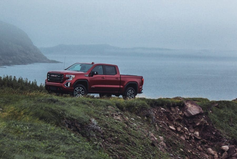 GMC1 A truck parked on the side of a hill