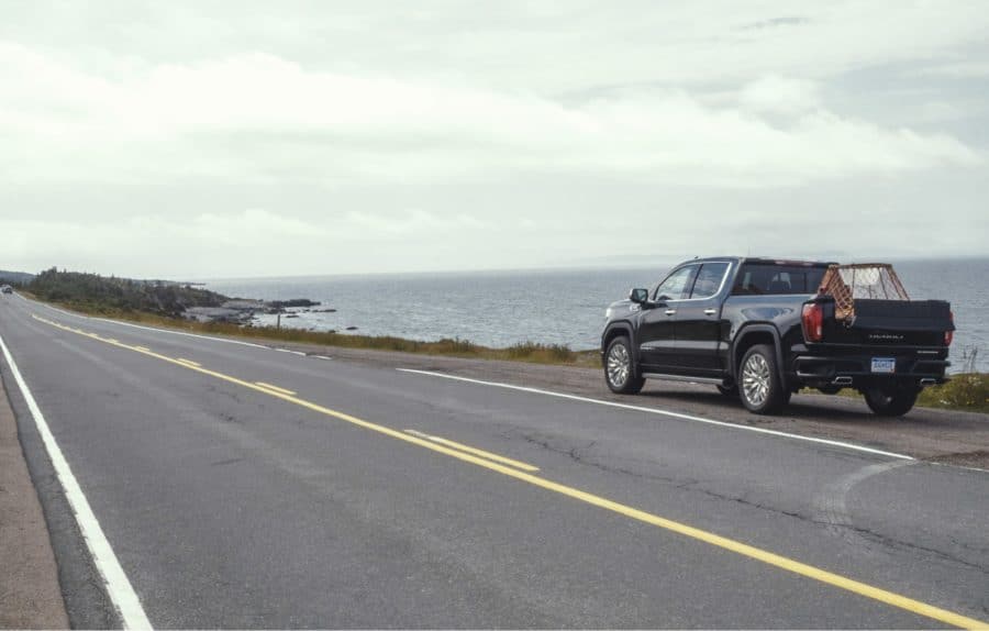 GMC11 A GMC Sierra parked on the side of a road