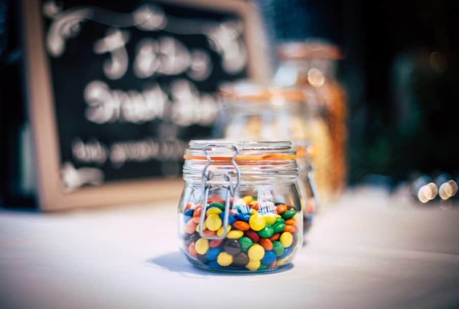 Image of sweet, jar, sign and table top HD photo by Clem Onojeghuo