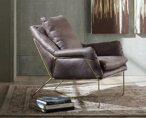 a dark grey faux leather upholstered armchair with gold metal frame