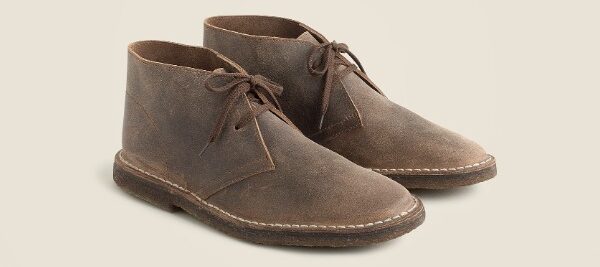 pair of leather chukka style boots