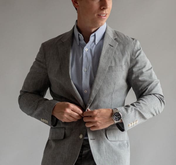 blue and white stripe short sleeve shirt with gray suit