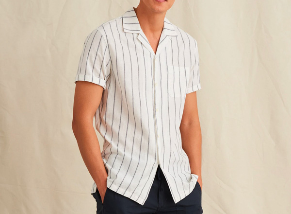 A person posing for the camera wearing Alex Mill shirt